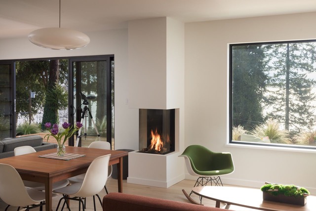 Dining area beside the corner fireplace